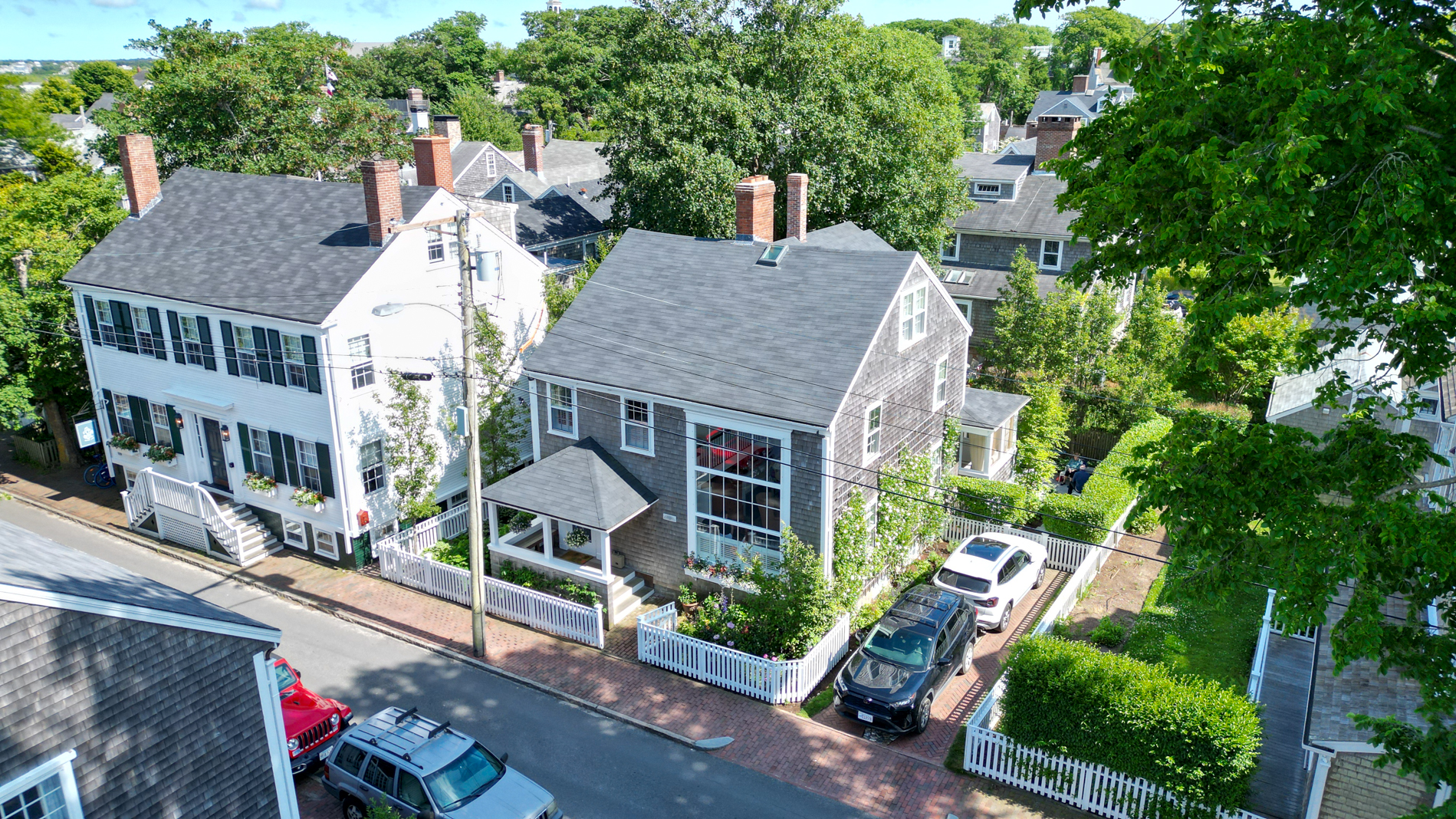 12 Hussey Street Nantucket, MA 02554 - Photo 2 of 47 an aerial view of a house with a yard