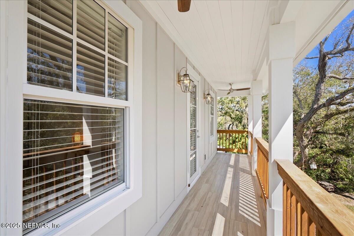 168 Surfside Avenue St. Augustine, FL 32084 - Photo 15 of 28 a view of balcony and wooden floor
