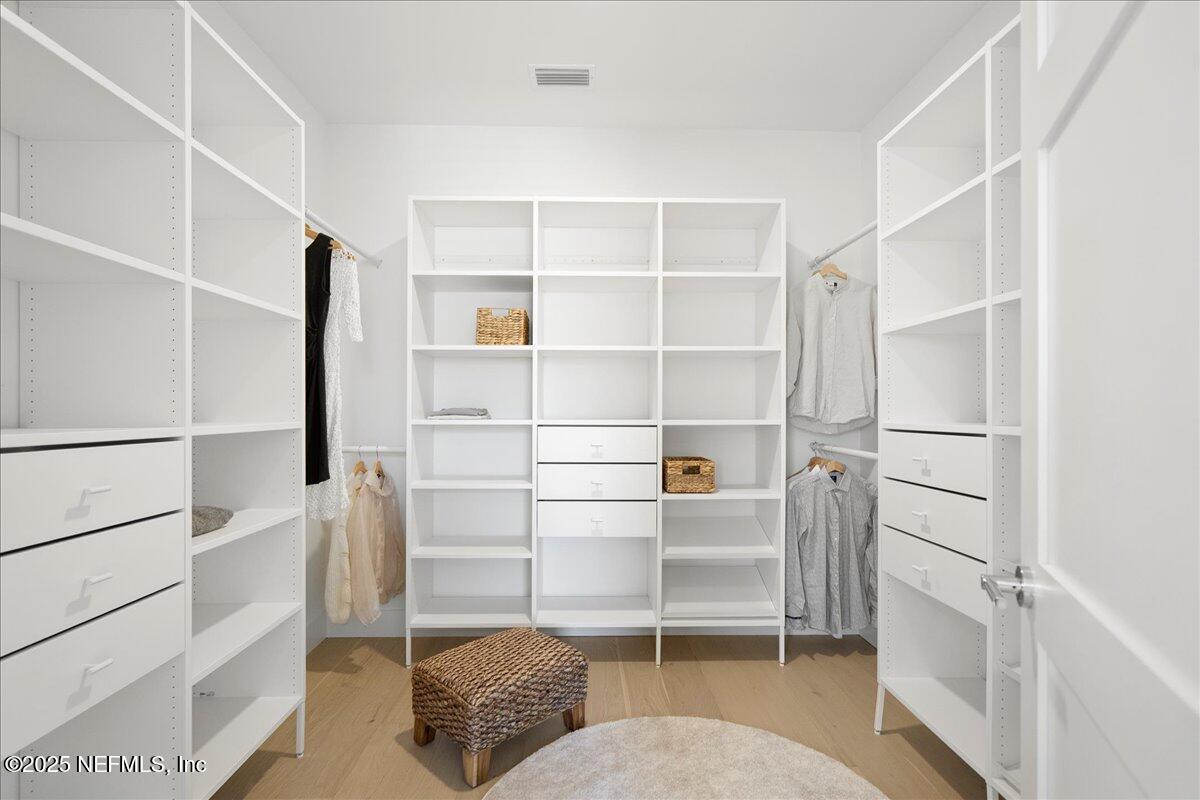 168 Surfside Avenue St. Augustine, FL 32084 - Photo 17 of 28 a view of walk in closet with empty racks