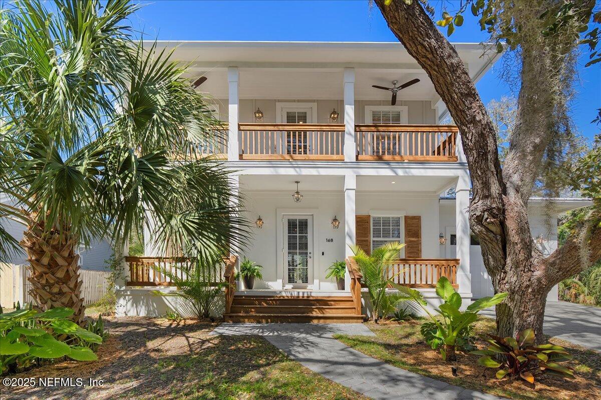 168 Surfside Avenue St. Augustine, FL 32084 - Photo 2 of 28 a front view of a house with garden
