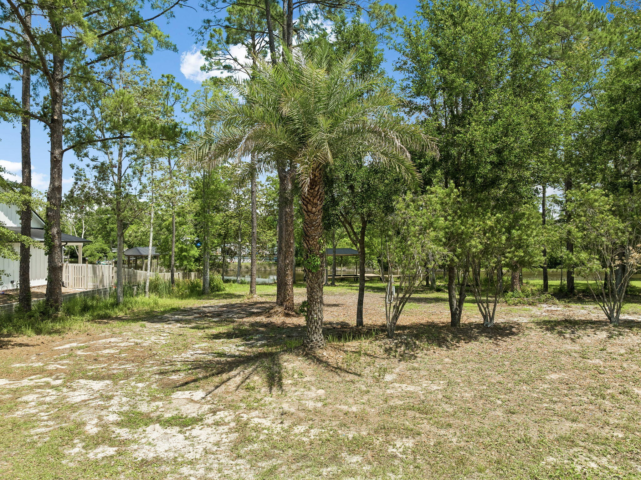 92 Waterside Lane Freeport, FL 32439 - Photo 17 of 28 a view of outdoor space with trees