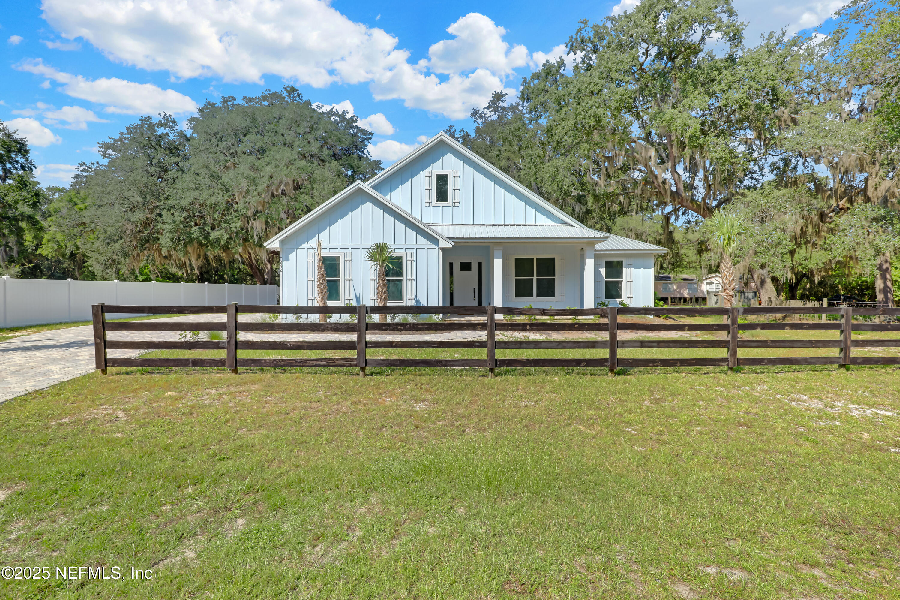 12092 Sheffield Road Jacksonville, FL 32226 - Photo 1 of 55 a house view with a garden space