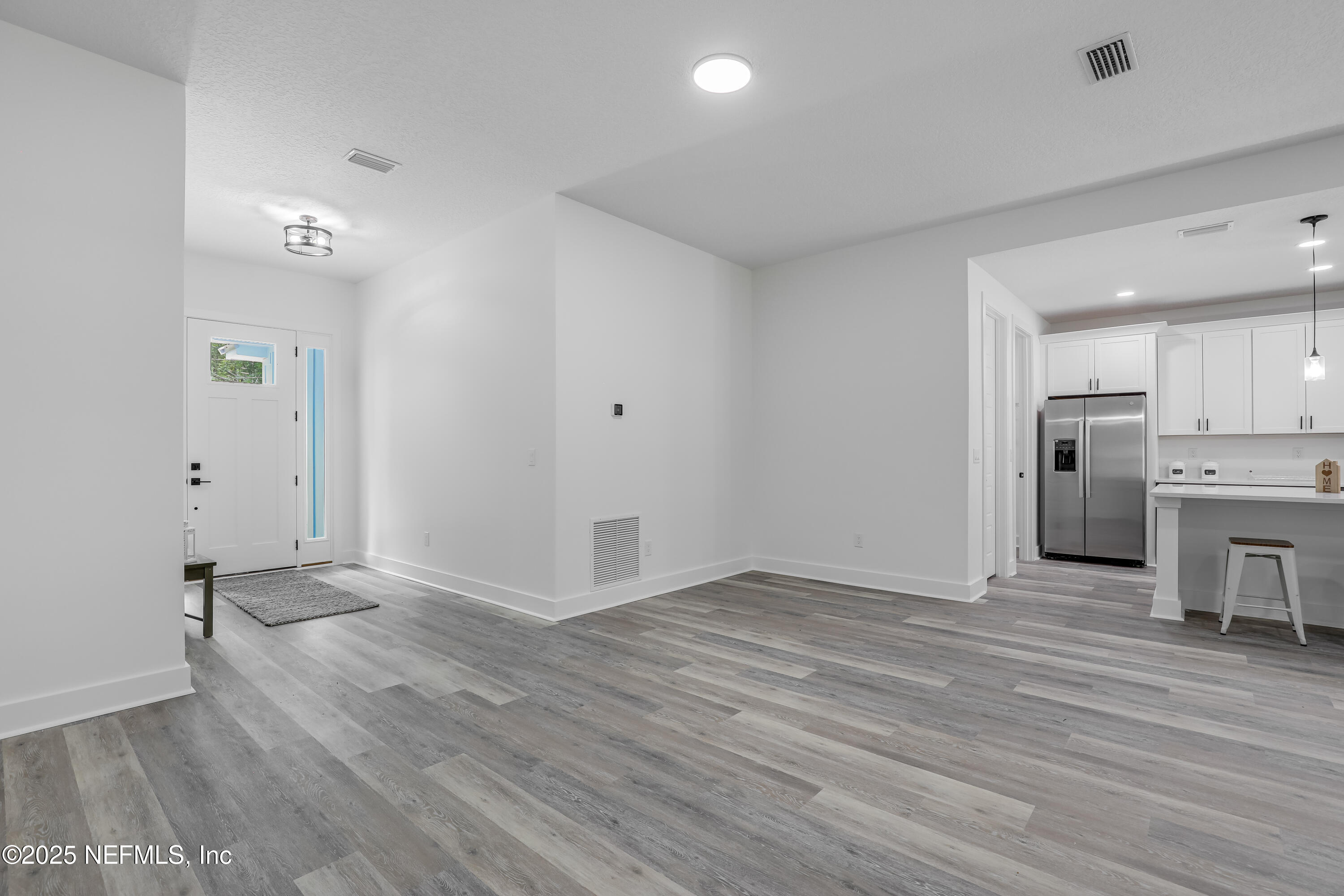 12092 Sheffield Road Jacksonville, FL 32226 - Photo 20 of 55 a view of a kitchen with wooden floor