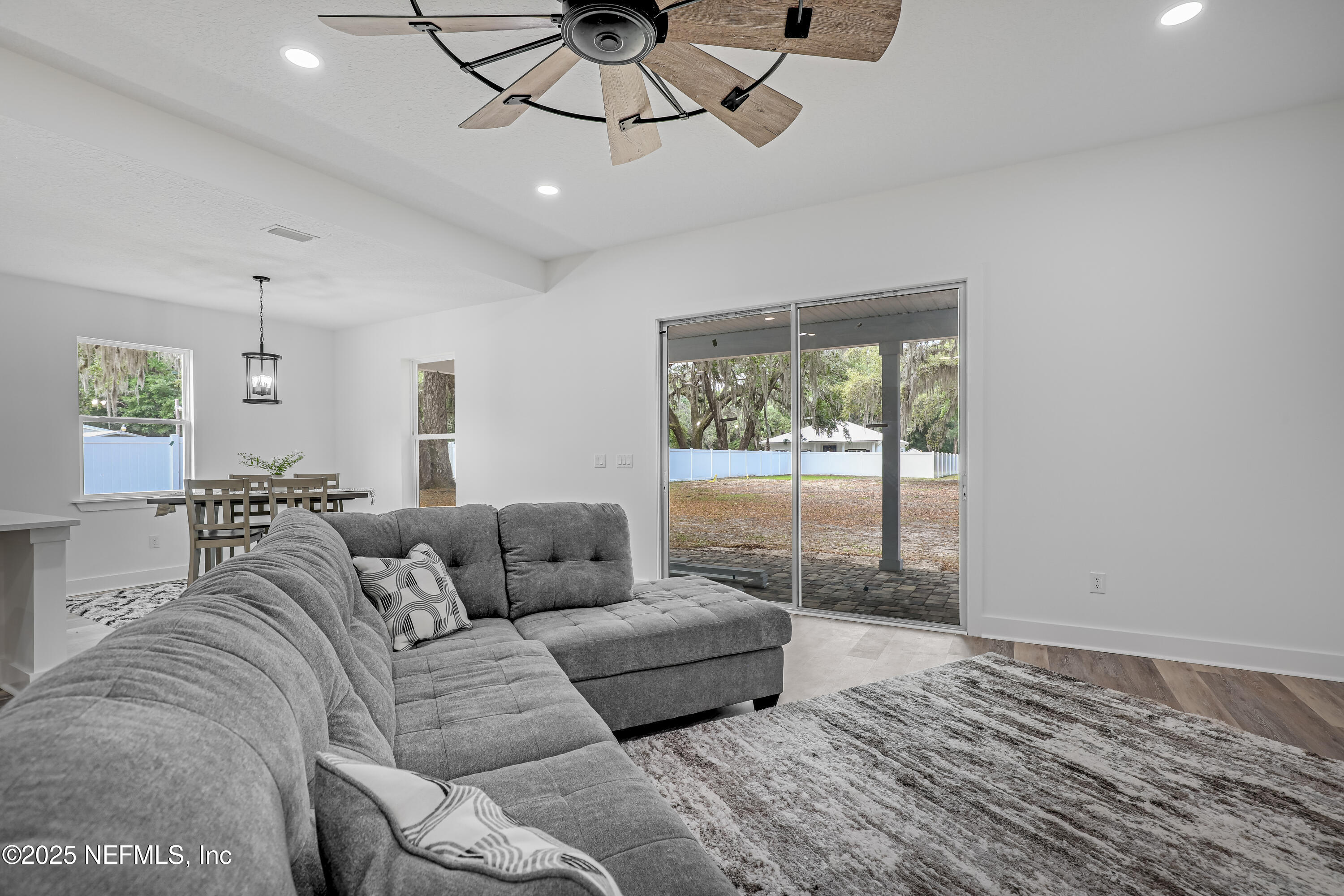 12092 Sheffield Road Jacksonville, FL 32226 - Photo 23 of 55 a living room with furniture and a window