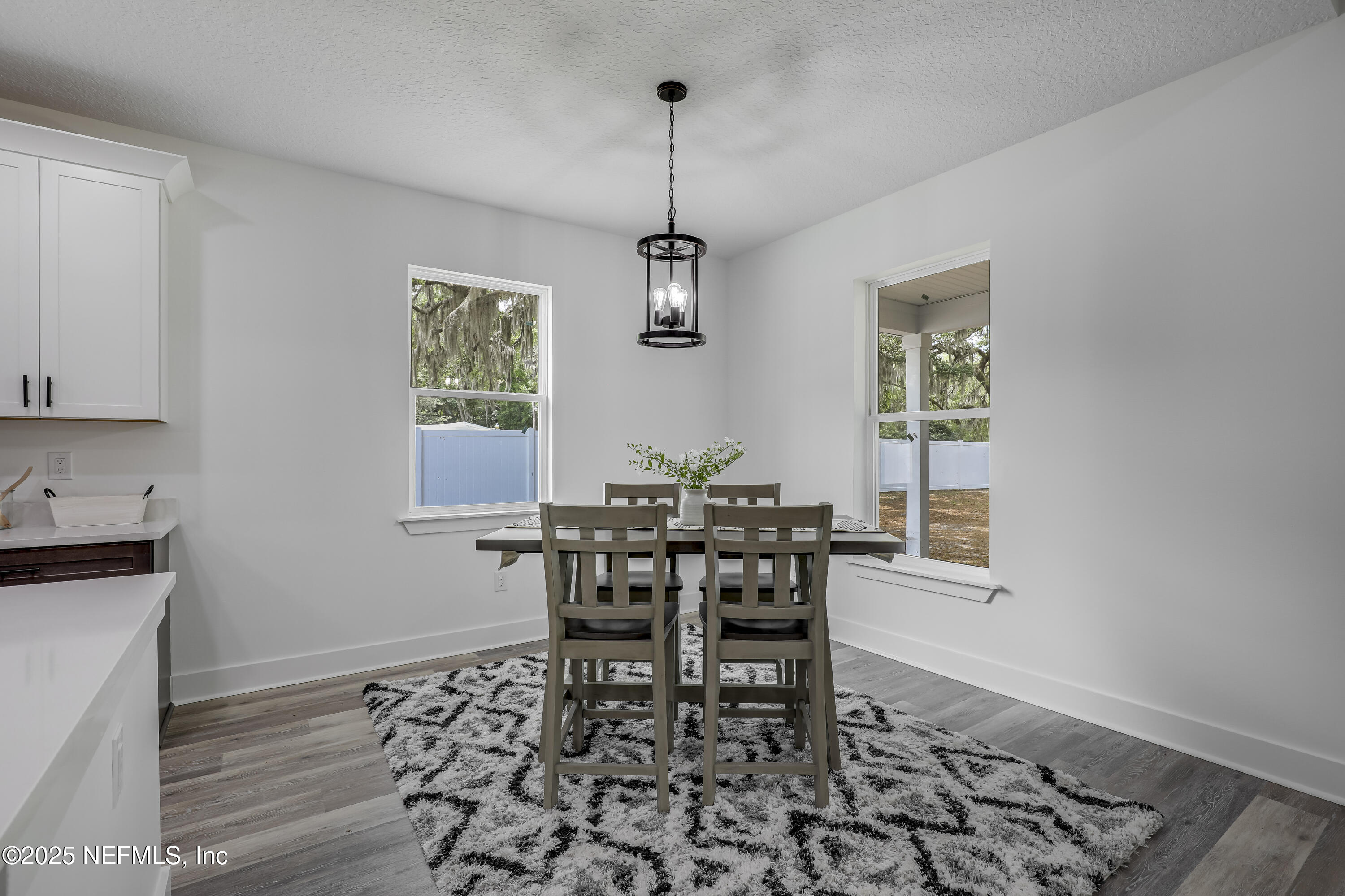 12092 Sheffield Road Jacksonville, FL 32226 - Photo 31 of 55 a dining room with furniture and window