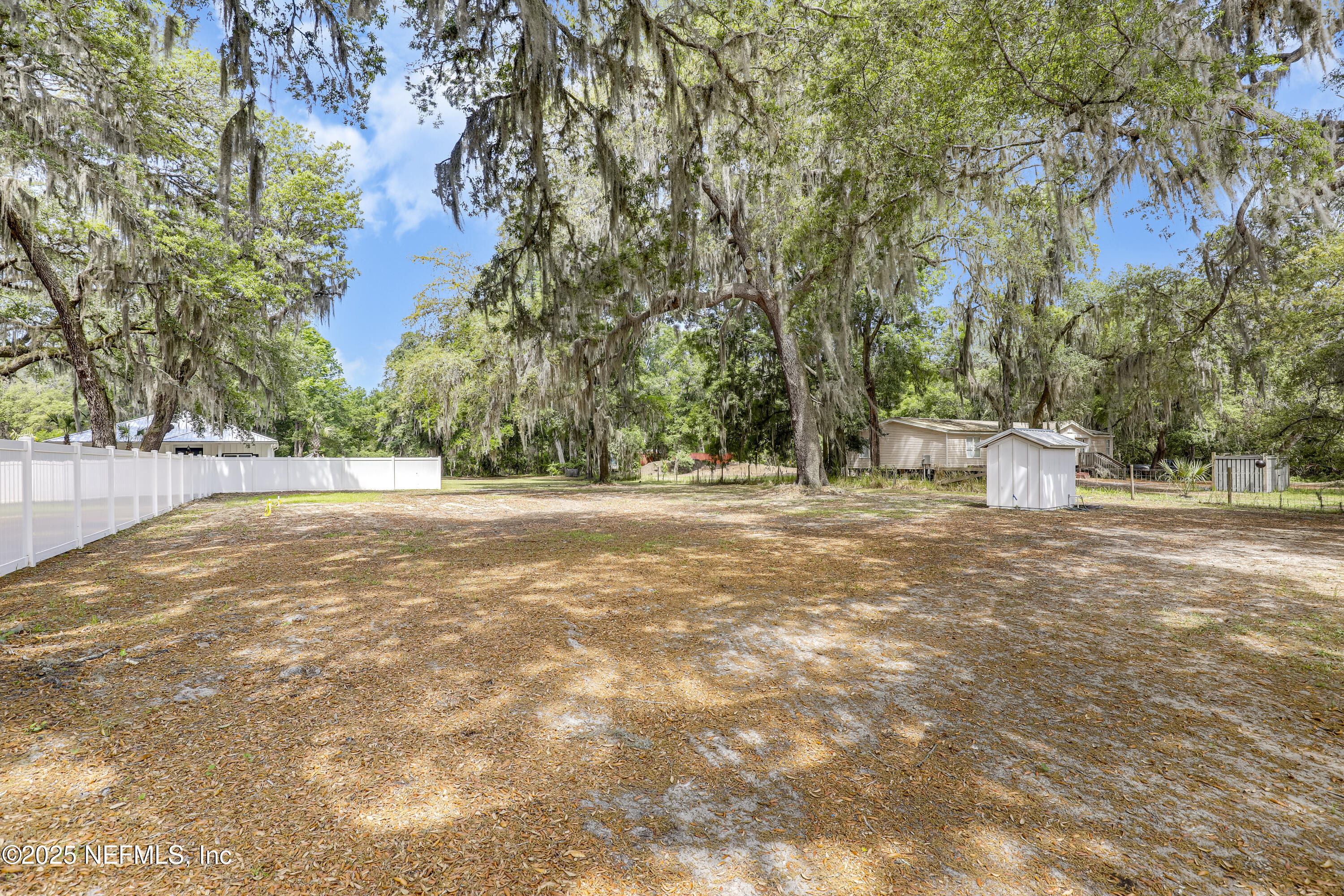 12092 Sheffield Road Jacksonville, FL 32226 - Photo 40 of 55 a view of road and trees