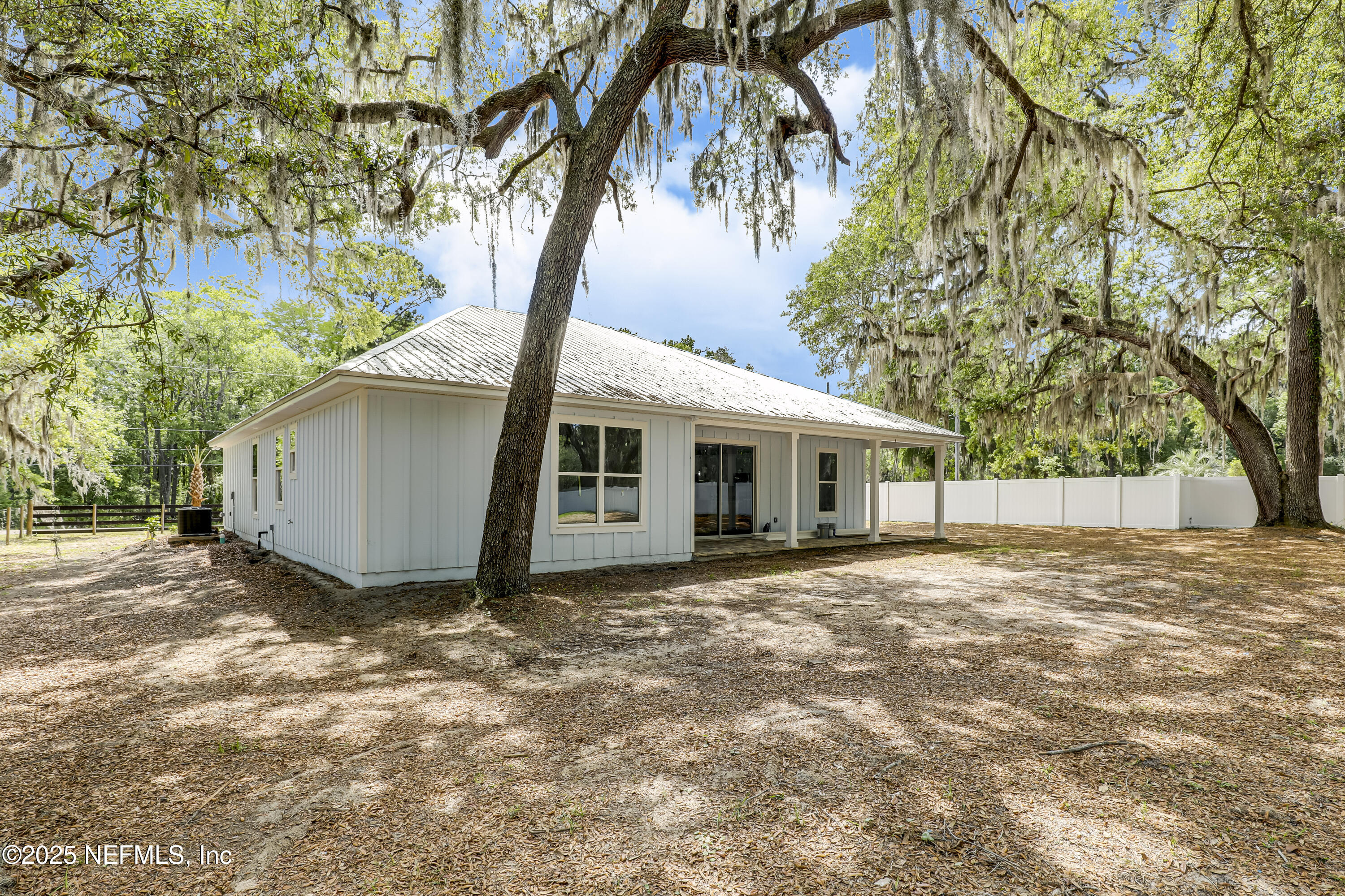 12092 Sheffield Road Jacksonville, FL 32226 - Photo 42 of 55 a view of a house with a yard