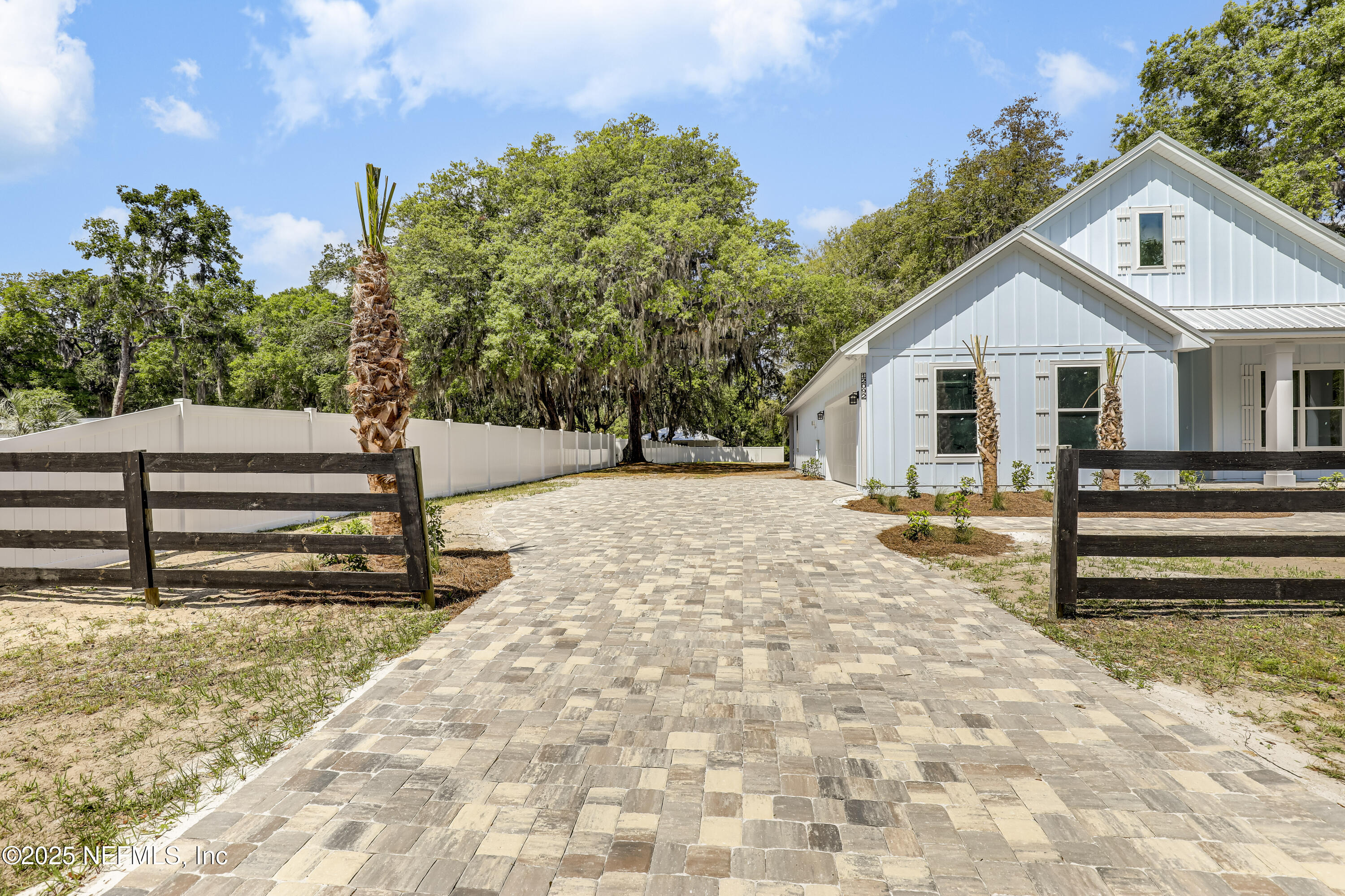 12092 Sheffield Road Jacksonville, FL 32226 - Photo 44 of 55 a view of a house with a yard