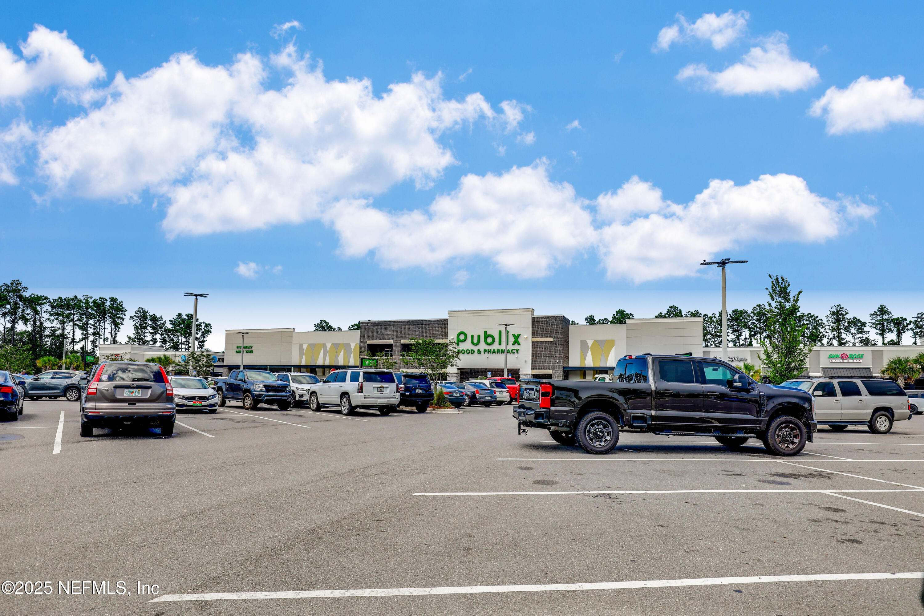 12092 Sheffield Road Jacksonville, FL 32226 - Photo 46 of 55 a view of cars parked in front of a building