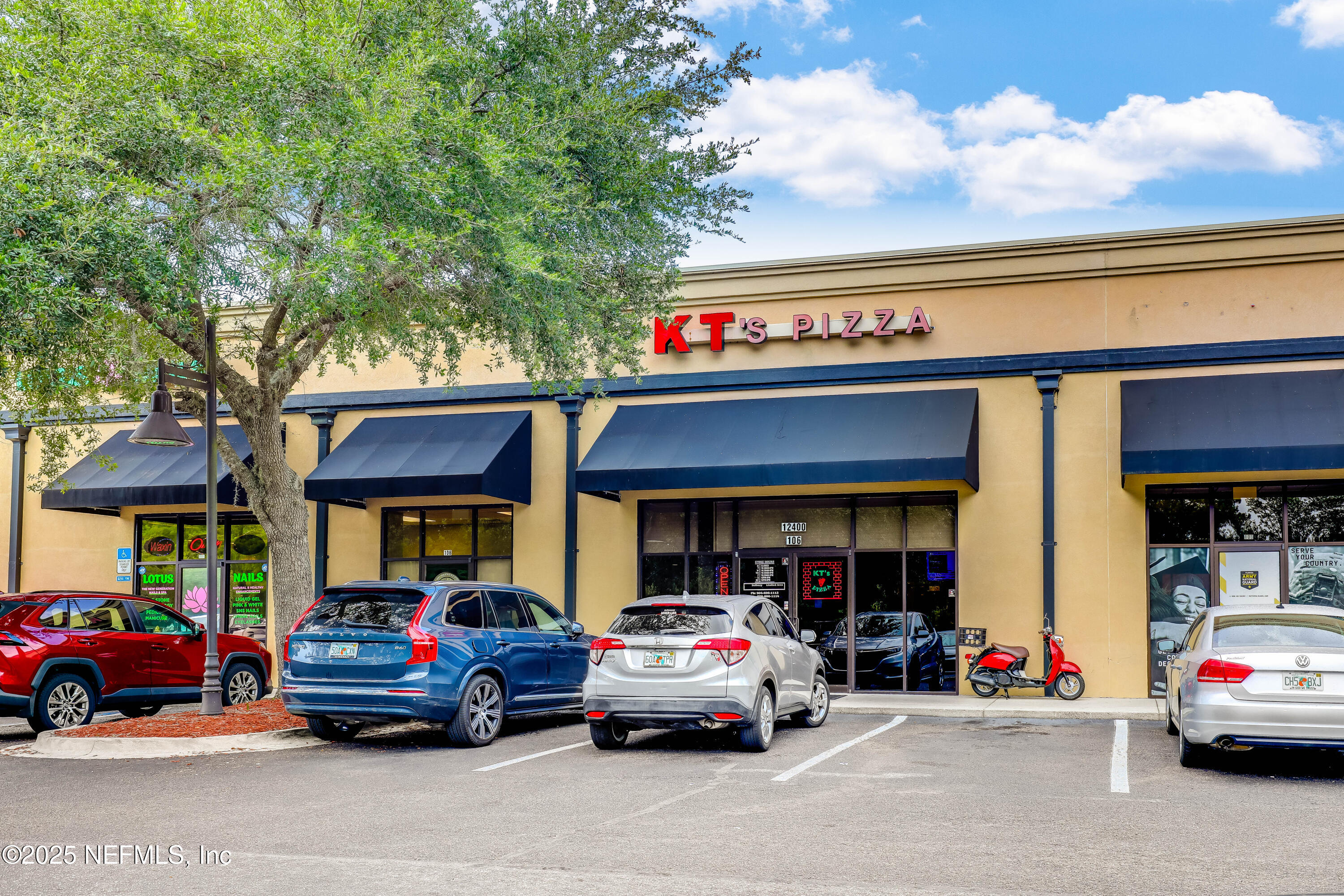 12092 Sheffield Road Jacksonville, FL 32226 - Photo 52 of 55 a car parked in front of a store