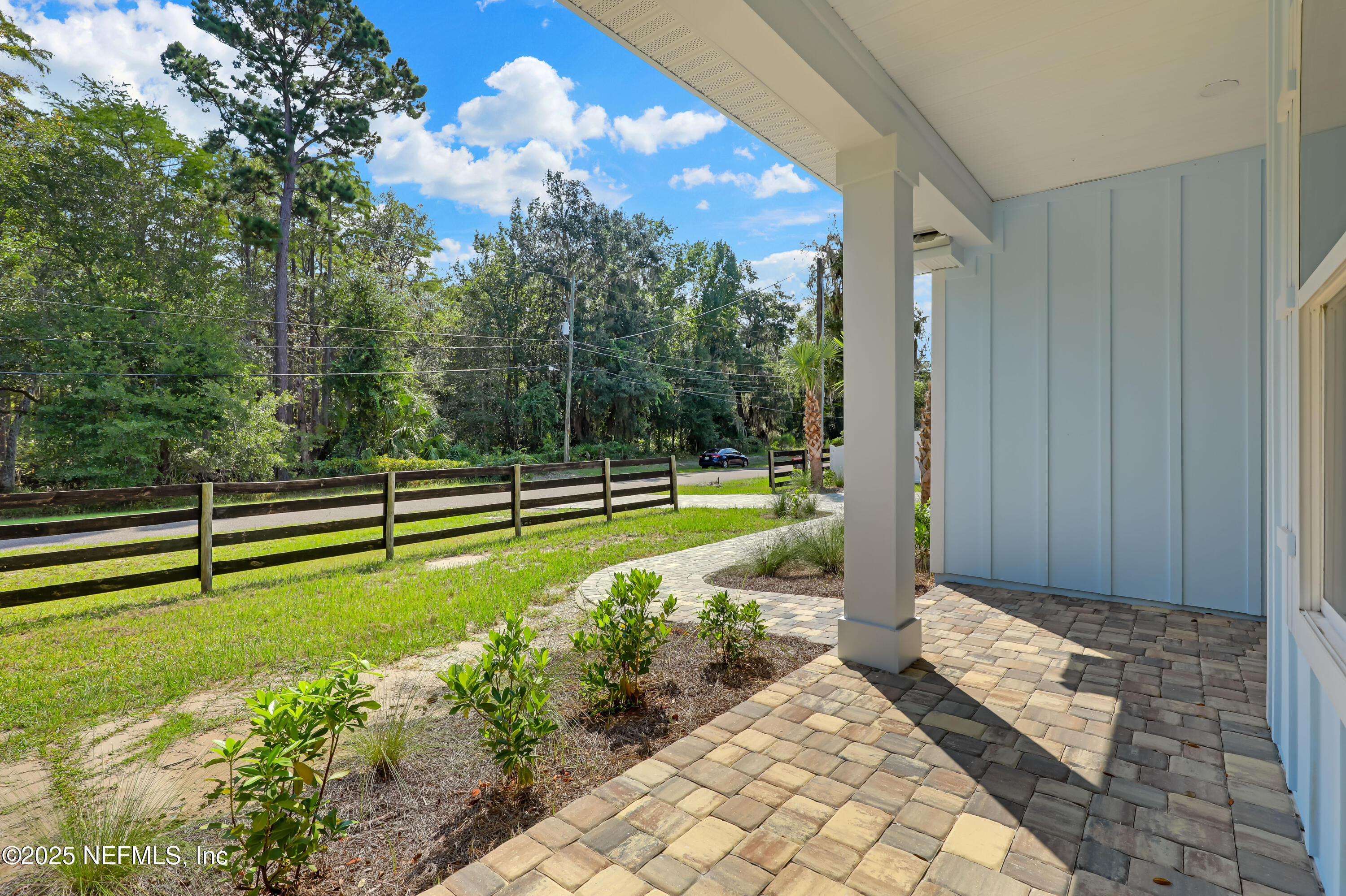 12092 Sheffield Road Jacksonville, FL 32226 - Photo 8 of 55 a view of a garden with large trees