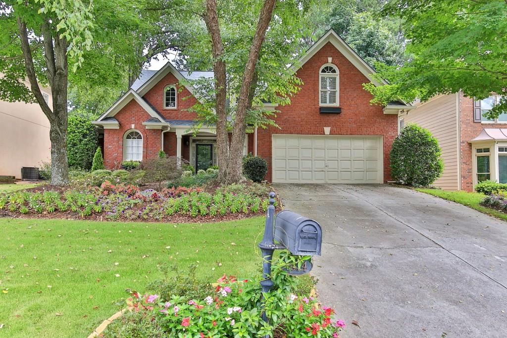 Welcome home!  Beautifully maintained traditional home in Paces Green swim/tennis community.