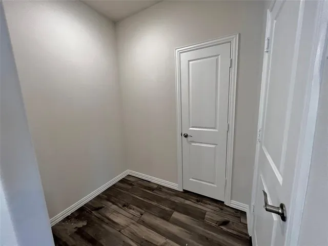 a small space with wooden floor