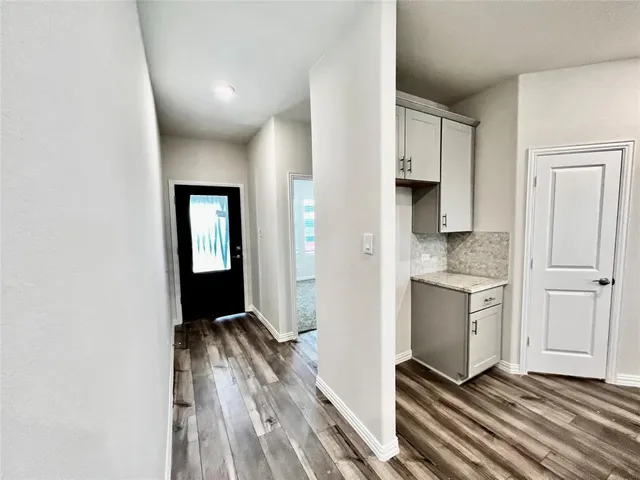 a view of kitchen and utility room