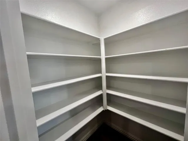 a sink sitting inside of a kitchen