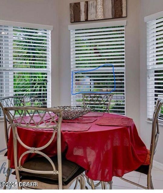 27 Reflections Village Drive Ormond Beach, FL 32174 - Photo 11 of 29 a view of a dining room with furniture