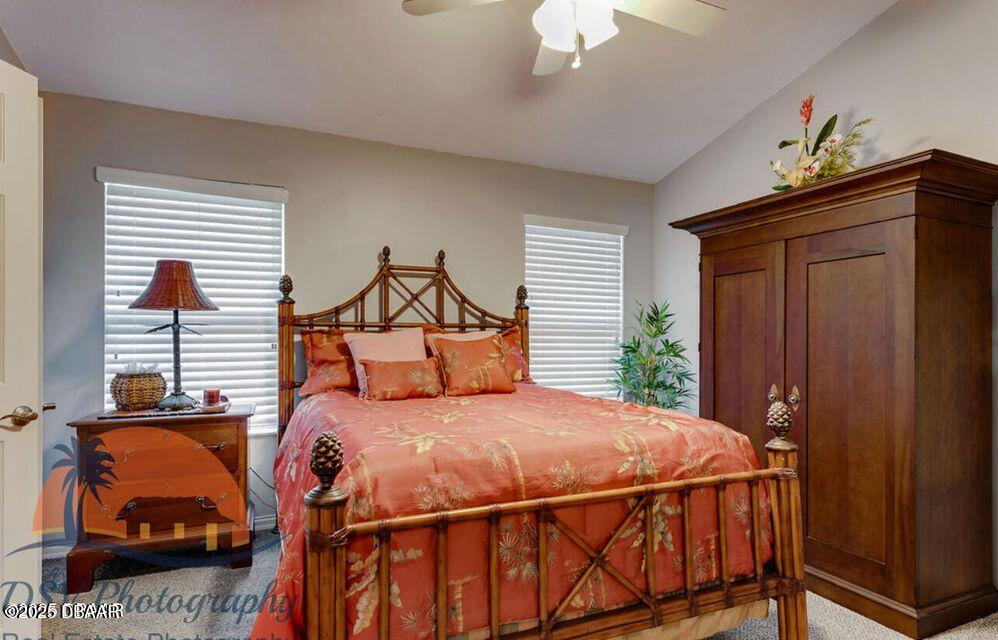 27 Reflections Village Drive Ormond Beach, FL 32174 - Photo 21 of 29 a bedroom with a bed and a window