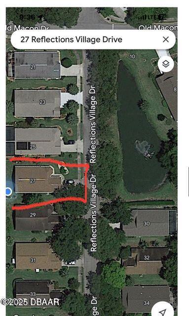 27 Reflections Village Drive Ormond Beach, FL 32174 - Photo 26 of 29 an aerial view of a residential houses with outdoor space