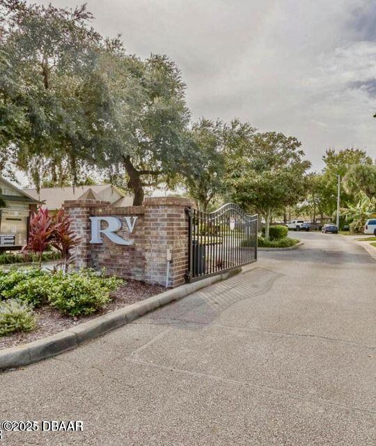 27 Reflections Village Drive Ormond Beach, FL 32174 - Photo 27 of 29 a view of a street with a building in the background