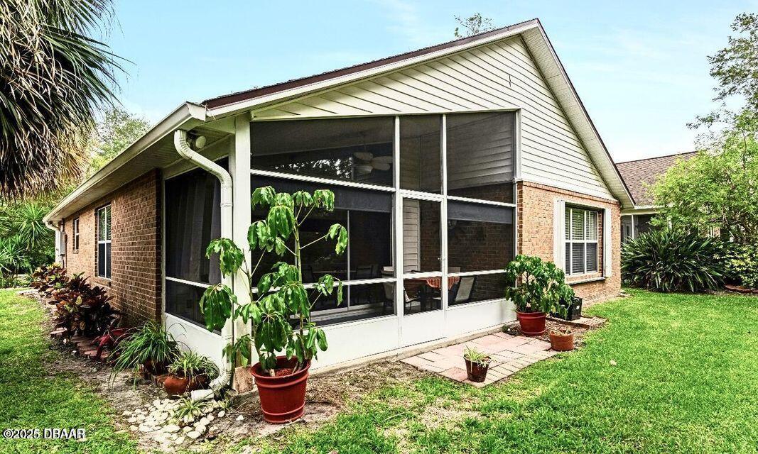 27 Reflections Village Drive Ormond Beach, FL 32174 - Photo 29 of 29 a view of house with backyard and garden