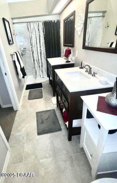 27 Reflections Village Drive Ormond Beach, FL 32174 - Photo 6 of 29 a bathroom with a sink mirror and vanity