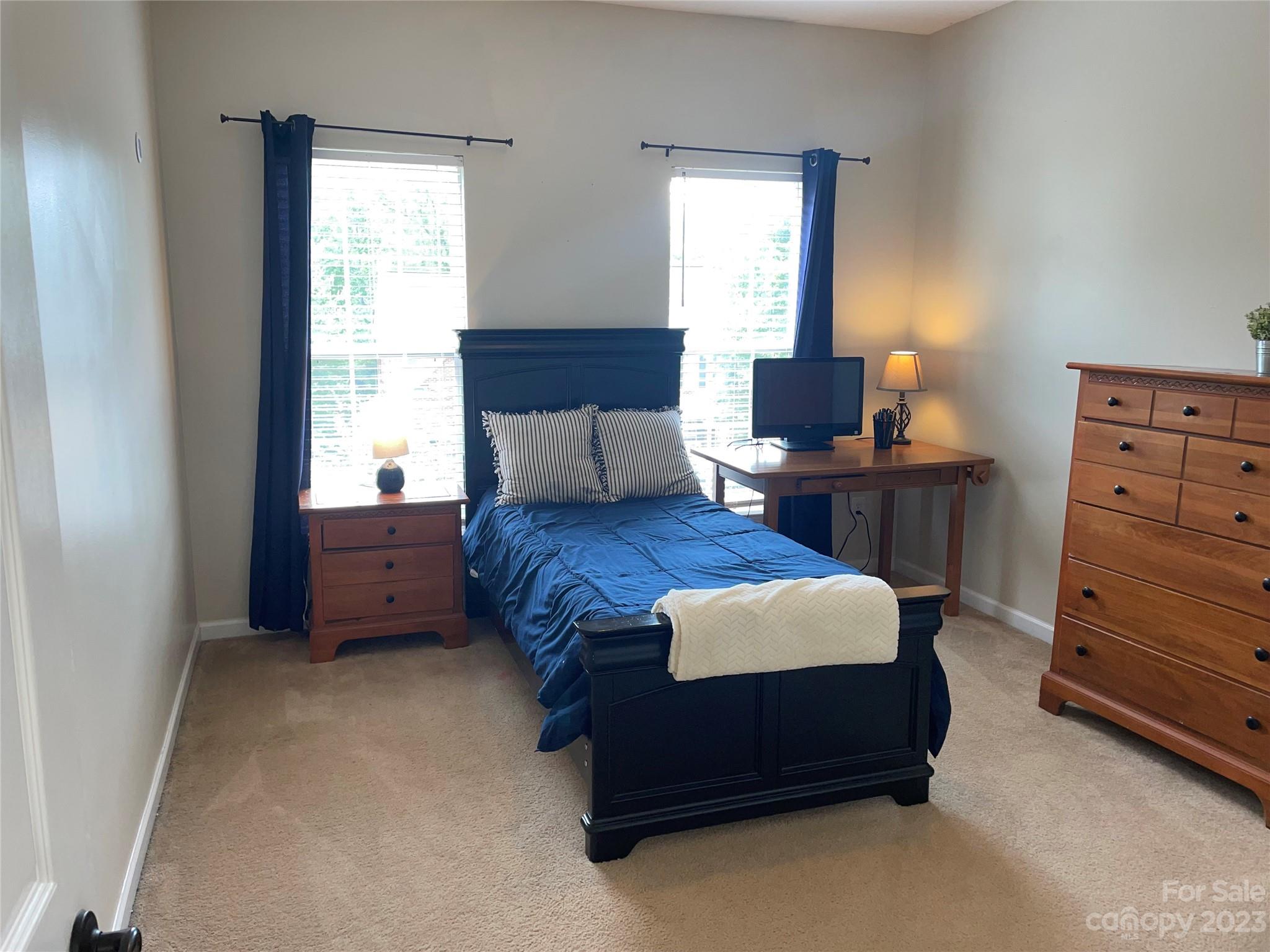1958 Faison Avenue Fort Mill, SC 29708 - Photo 30 of 37 a bedroom with a bed and a dresser