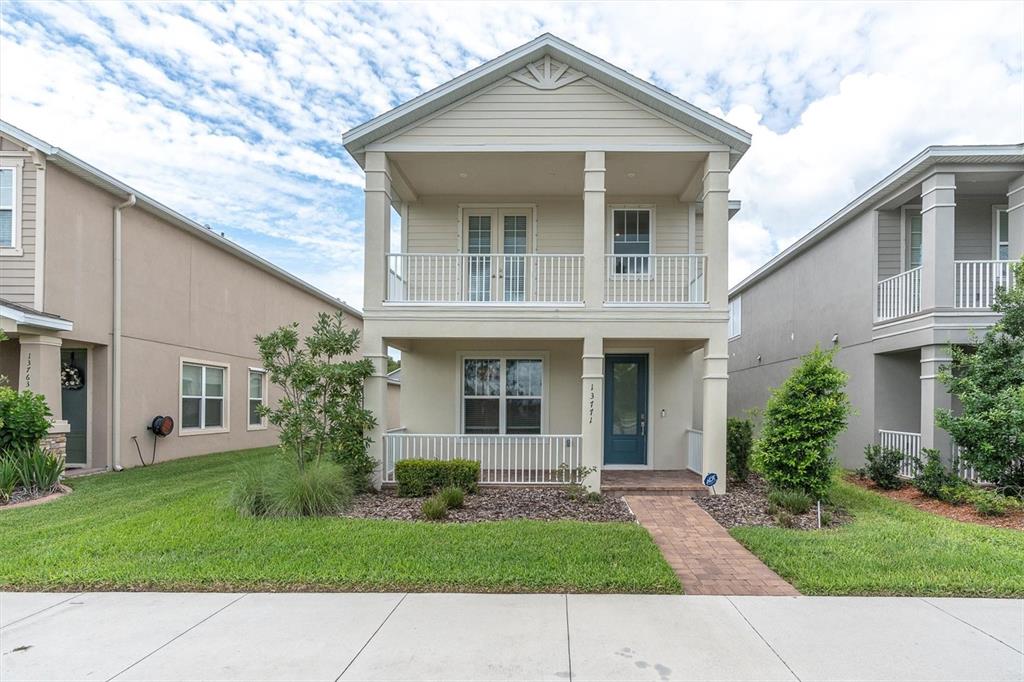 a front view of a house with a yard