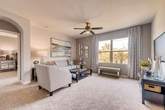 1015 Wabash Road Southeast Palm Bay, FL 32909 - Photo 7 of 14 Cali-small-001-6-Living Room-666x445-72d