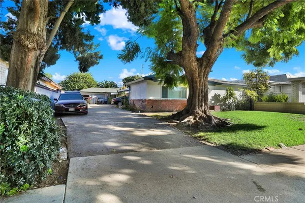 a view of a backyard with a garden