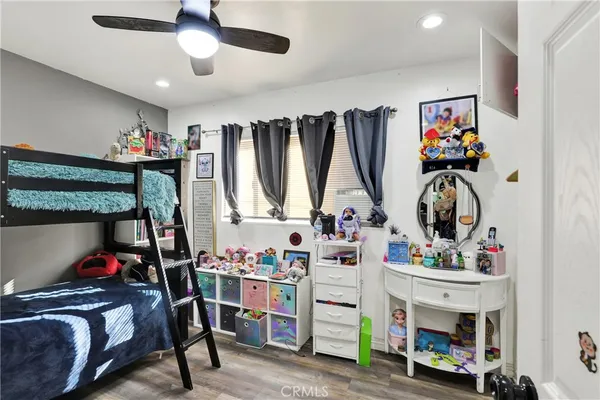 a backyard of a house with lots of green space and fountain