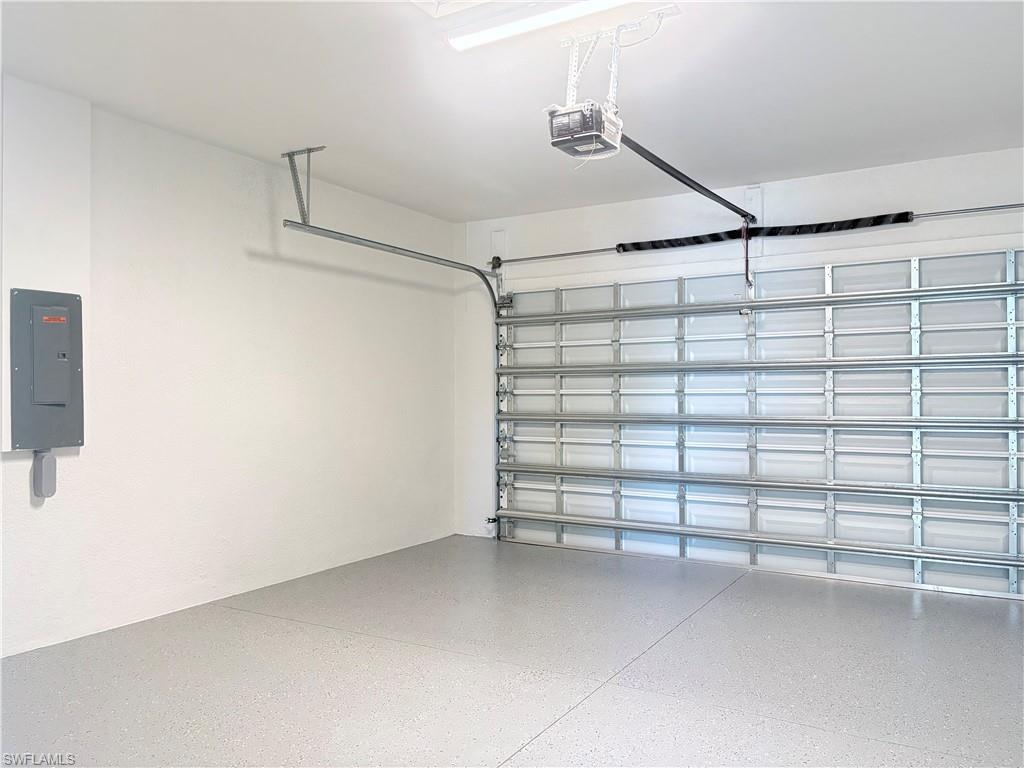 423 Harshaw Street Lehigh Acres, FL 33974 - Photo 21 of 27 a view of a garage