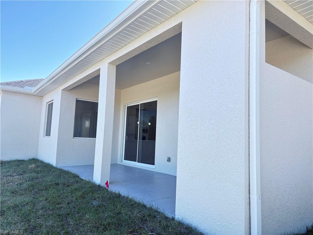 423 Harshaw Street Lehigh Acres, FL 33974 - Photo 23 of 27 a view of front door
