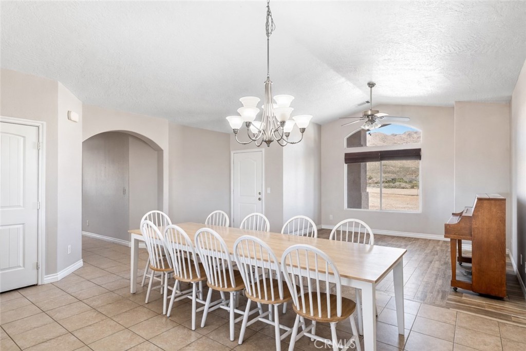13850 Night Shade Road Apple Valley, CA 92307 - Photo 10 of 75 a dining room with furniture and chandelier