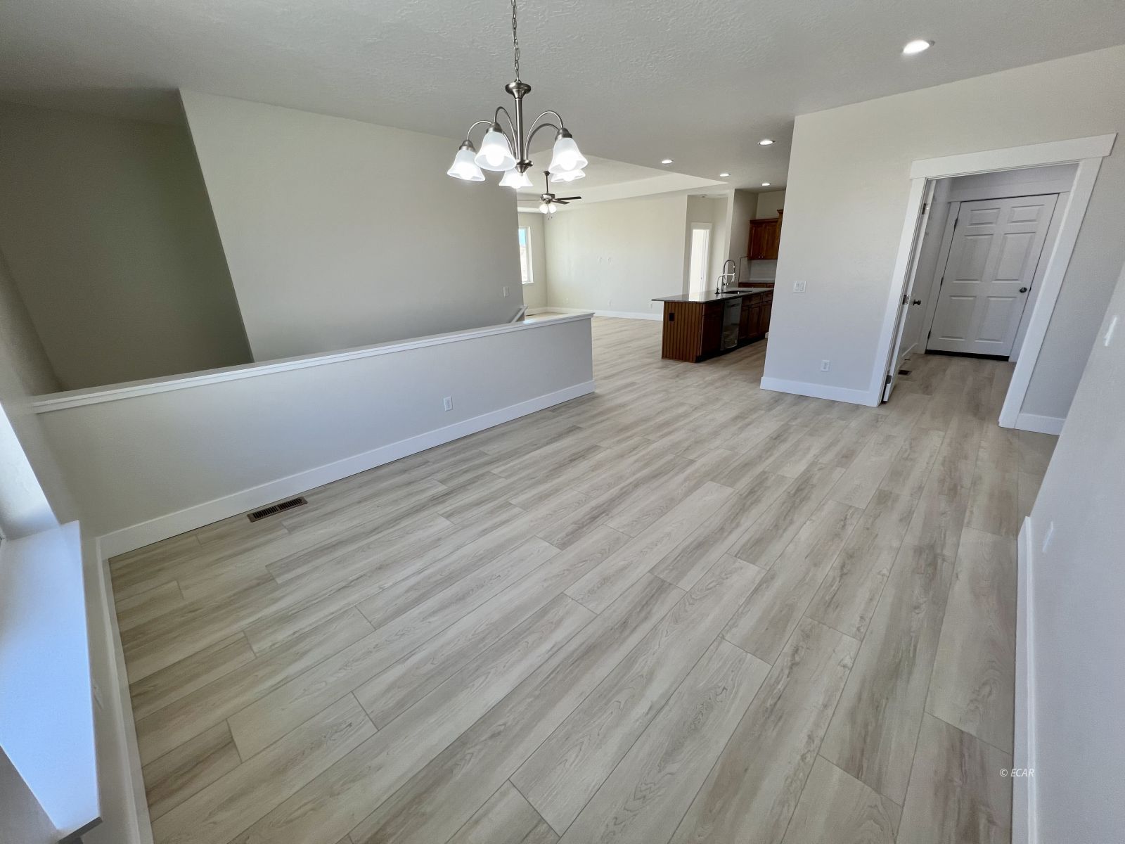 518 Ridgeway Drive Spring Creek, NV 89815 - Photo 3 of 37 a view of a livingroom with wooden floor
