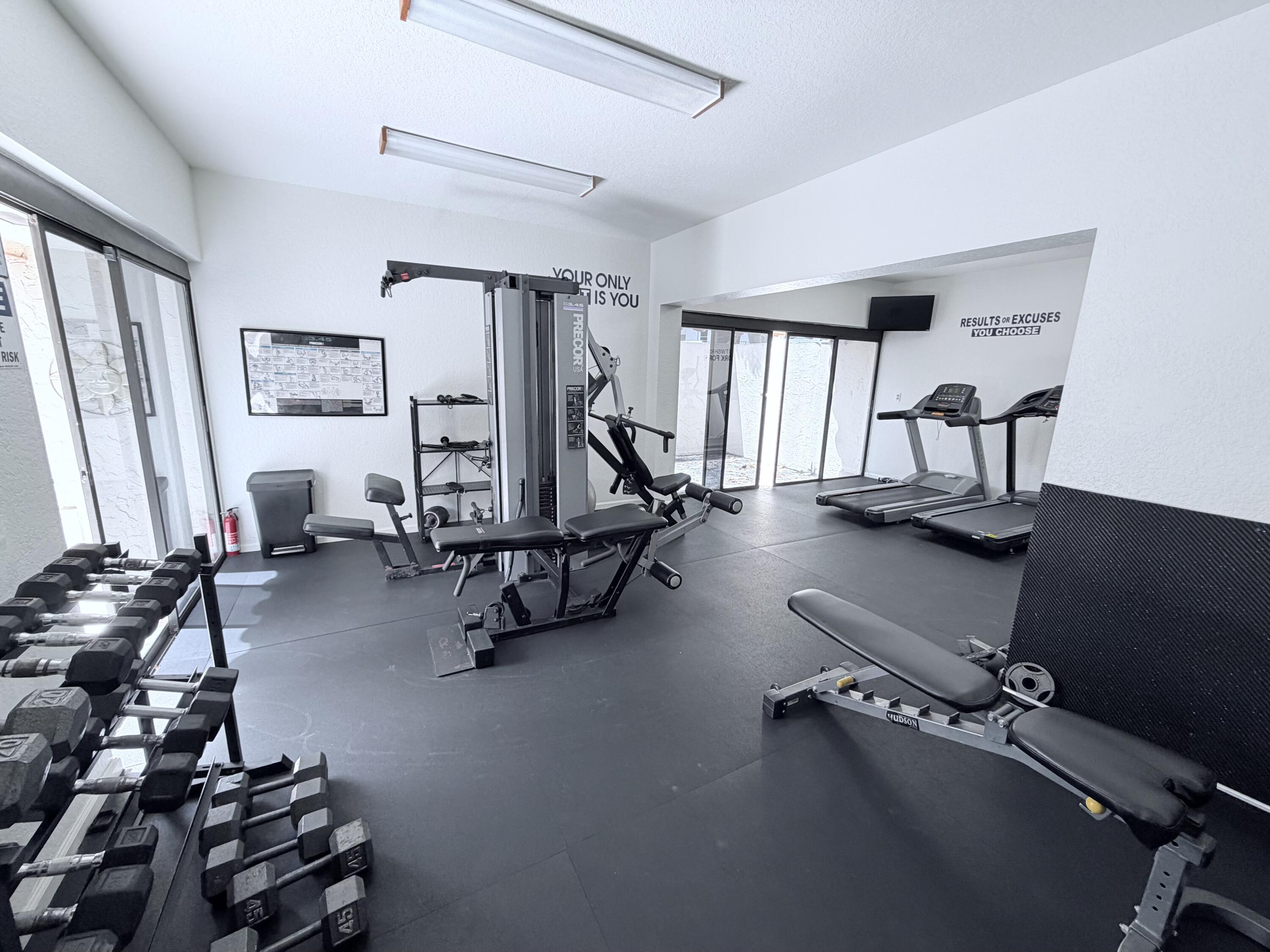 777 South Federal Highway, Unit RPH11 Pompano Beach, FL 33062 - Photo 22 of 32 a view of a room with gym equipment
