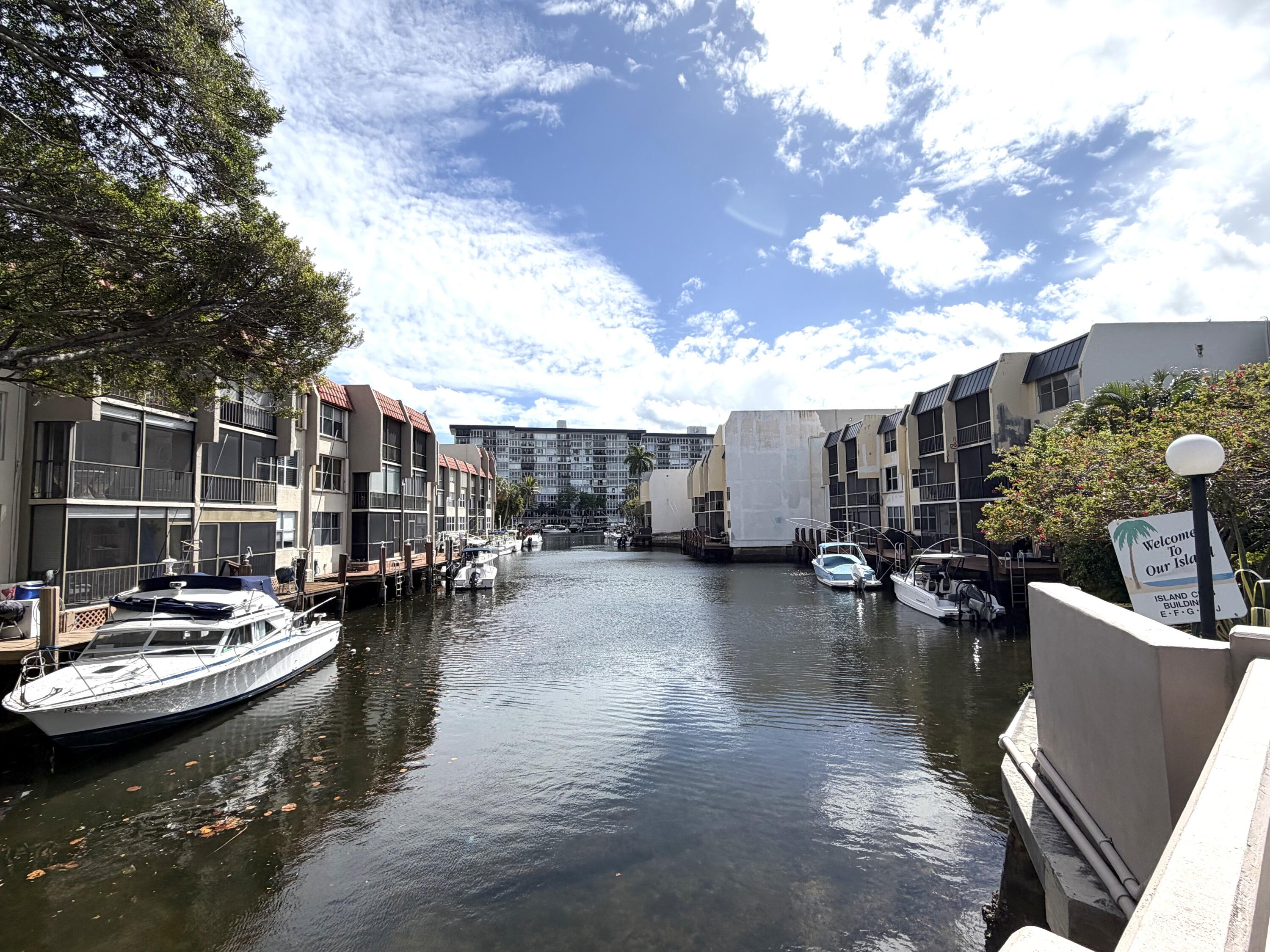 777 South Federal Highway, Unit RPH11 Pompano Beach, FL 33062 - Photo 29 of 32 a view of a lake with boats and trees