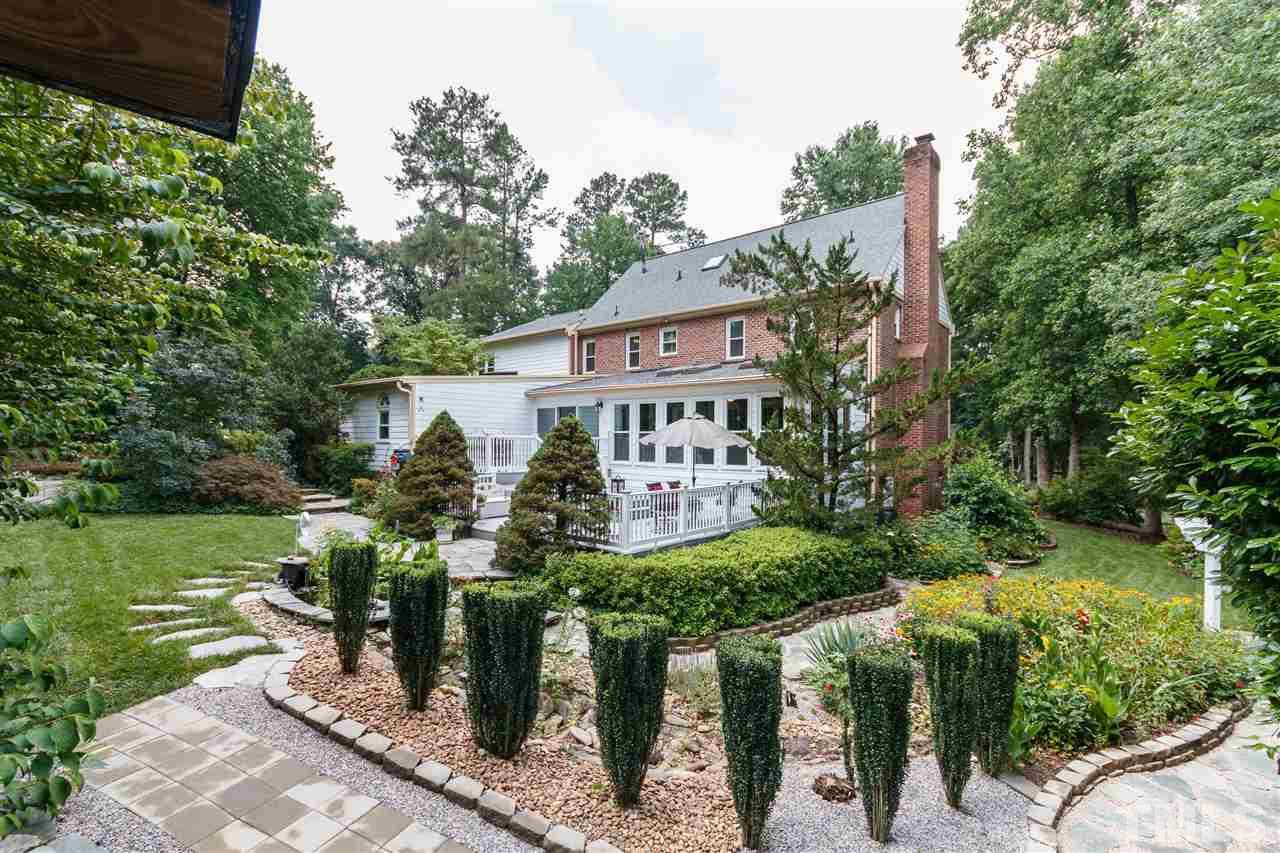 812 Misty Isle Place Raleigh, NC 27615 - Photo 24 of 25 a front view of a house with garden
