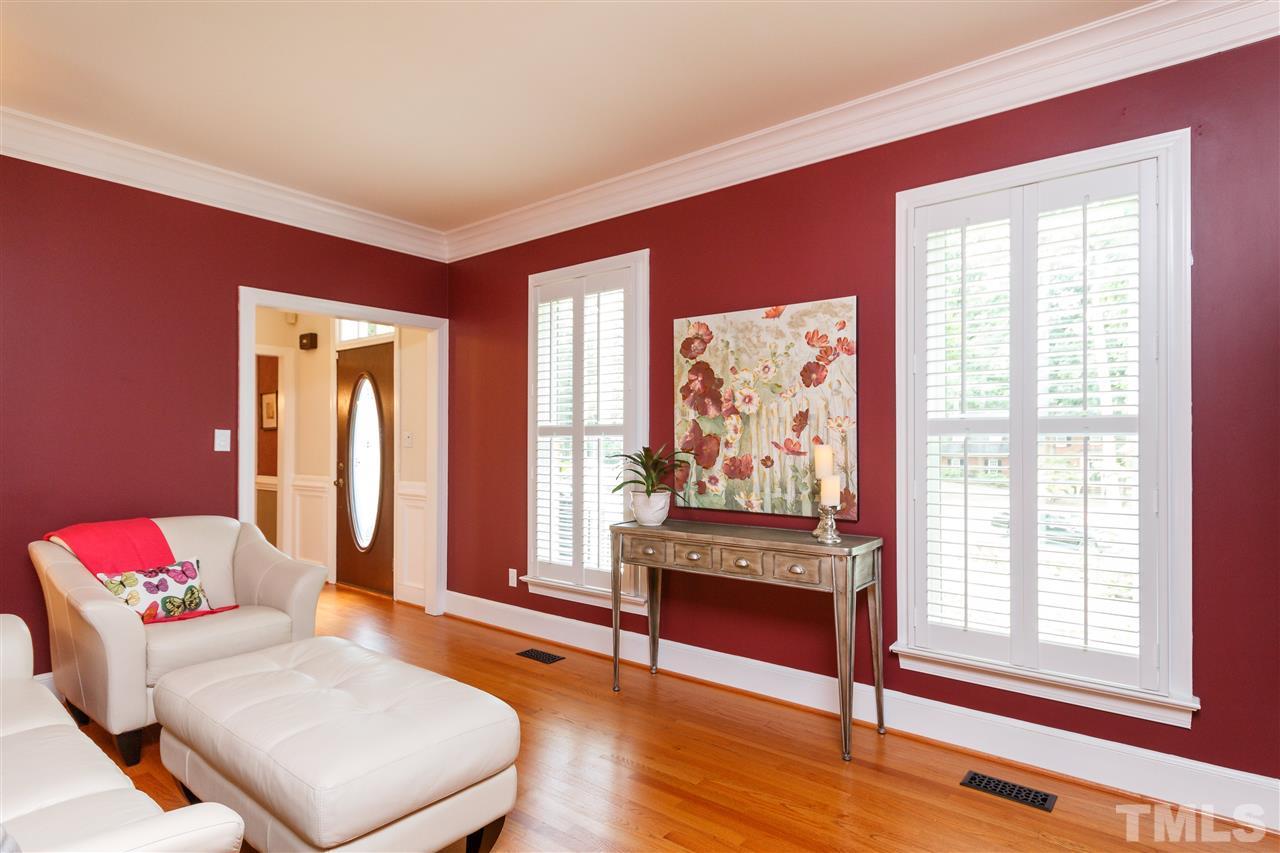 812 Misty Isle Place Raleigh, NC 27615 - Photo 4 of 25 a living room with furniture and a window