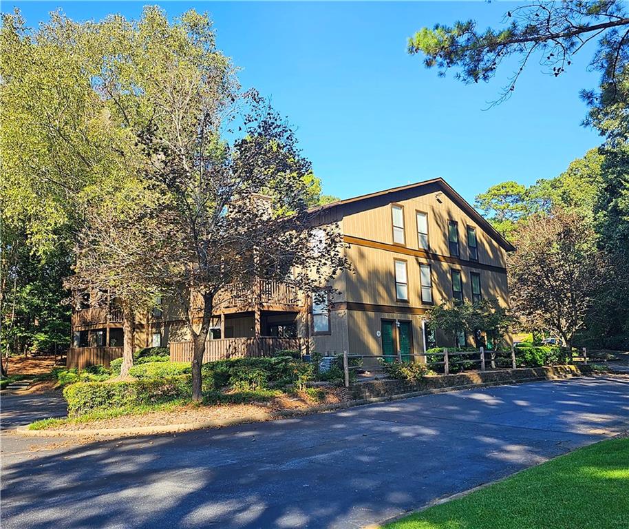 a view of a house with a street