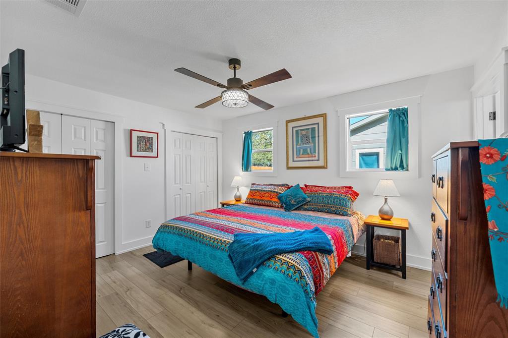 111 North Avenue R Clifton, TX 76634 - Photo 11 of 27 a bedroom with a bed a flat screen tv and dresser