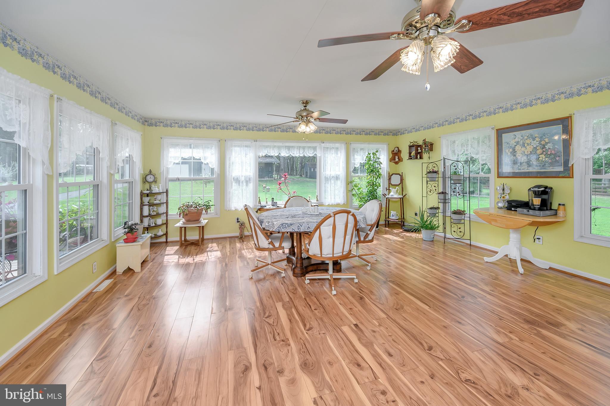 30306 Mine Run Road Locust Grove, VA 22508 - Photo 17 of 52 Massive Sunroom off the deck leading to kitchen