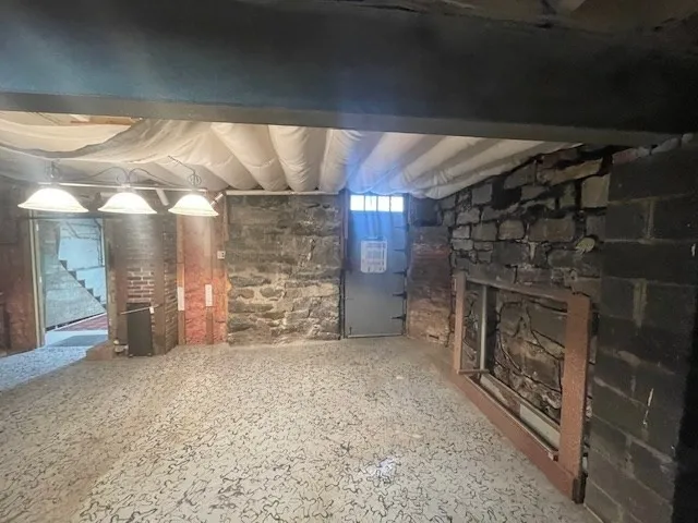 a view of storage and utility room