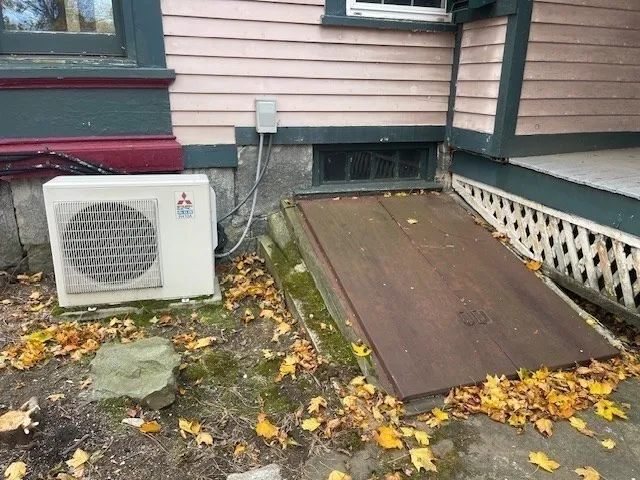 a view of a backyard with a chair