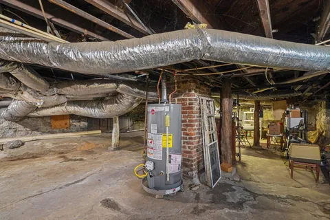 a view of a backyard with wooden fence