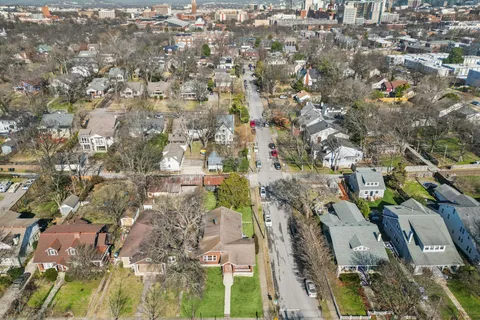 a view of street with sitting area