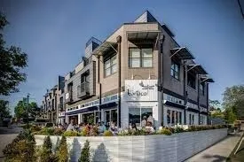 a view of a building and a tree