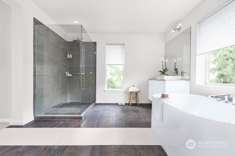 6555 Southeast 8th Street Renton, WA 98059 - Photo 11 of 11 a living room with a bath tub and a shower
