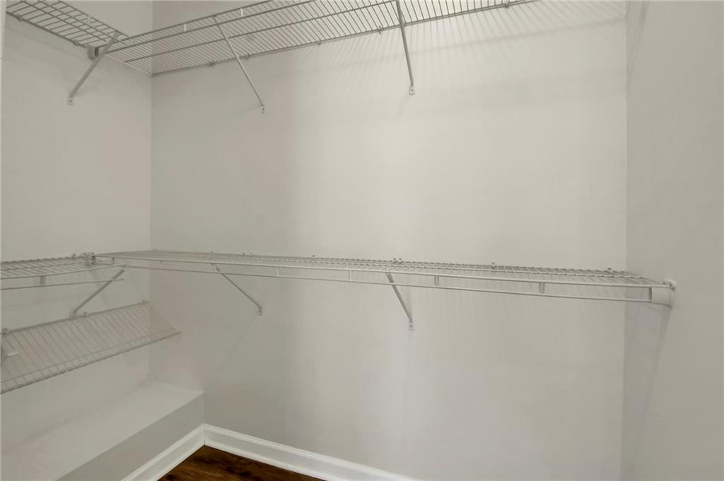 2042 Bolton Road Northwest Atlanta, GA 30318 - Photo 17 of 30 a view of a room with racks on the wall