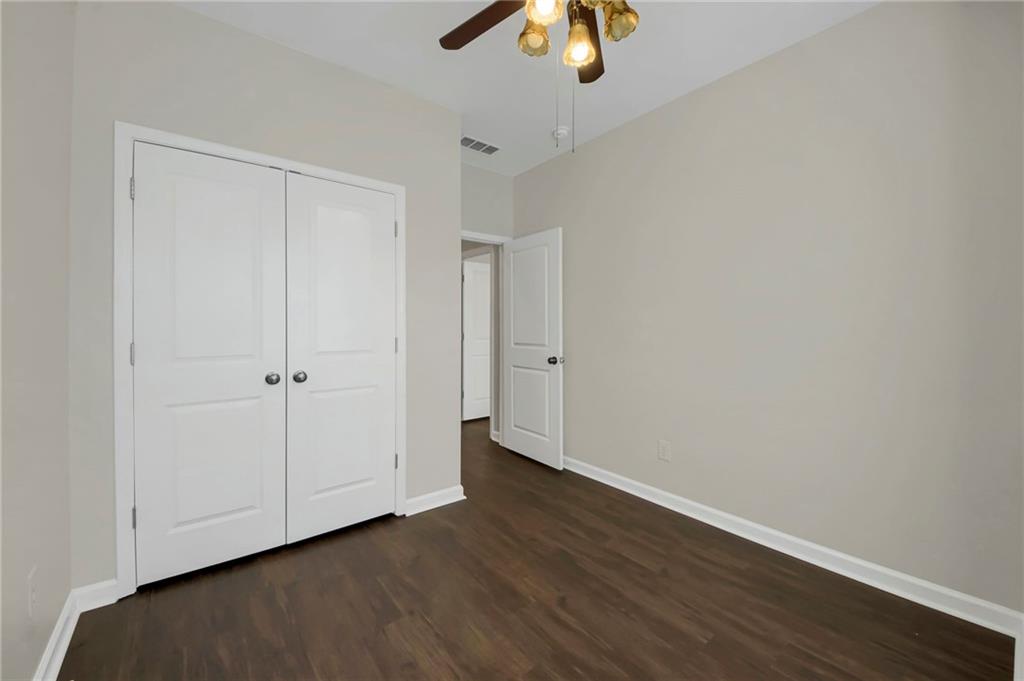 2042 Bolton Road Northwest Atlanta, GA 30318 - Photo 21 of 30 wooden floor in an empty room