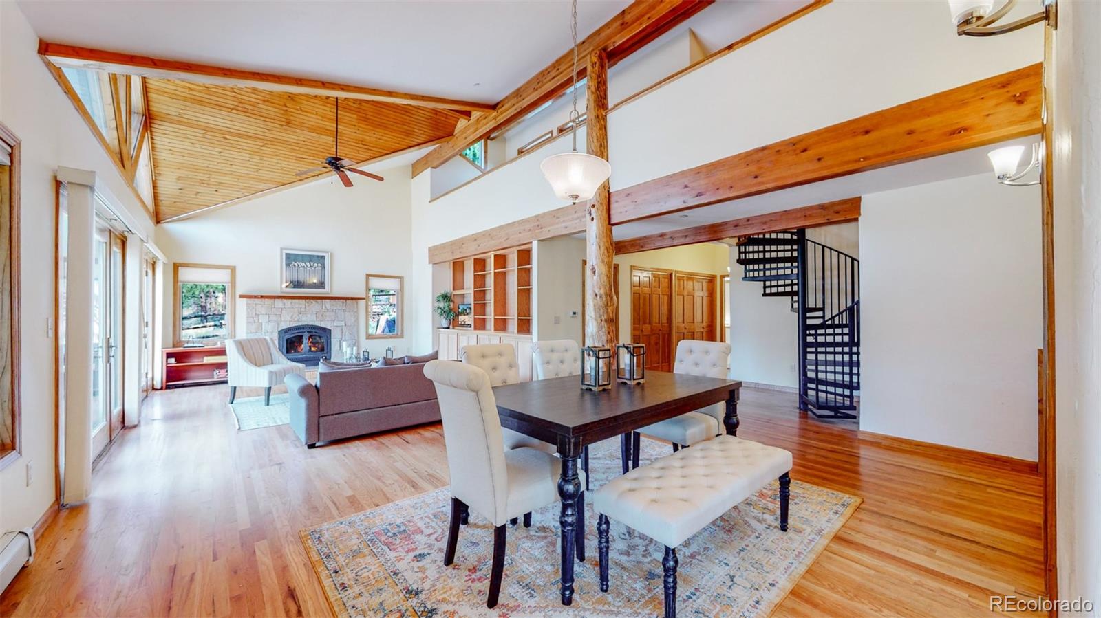 153 Ski Road East Allenspark, CO 80510 - Photo 11 of 40 a living room with furniture and a wooden floor